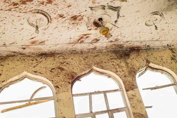 Inside the blood splattered Imam Zamam Grand Mosque the morning after a suicide bomber detonated explosives during Friday prayers. Reports of the number of victims have varied but are likely to have been more than 50.