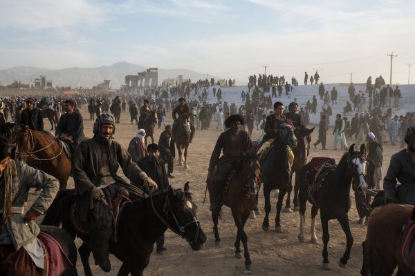 Buzkashi players leave the field after the traditional final match of the season on the Persian New Year holiday in the northern city of Mazar-i Sharif. Afghanistan's national sport, Buzkashi sees horsemen vying for a headless goat, which must be placed in a goal to score.