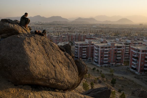 Samim Sediqi (left) and Iqbal hang out on a boulder, enjoying the sunset above the Khwaja Rawash apartment complex in the Qasaba area on the far northern edge of Kabul. The friends said they were amongst the first 10-12 families to move into the complex, which has a calm atmosphere seldom found in the rest of Afghanistan.