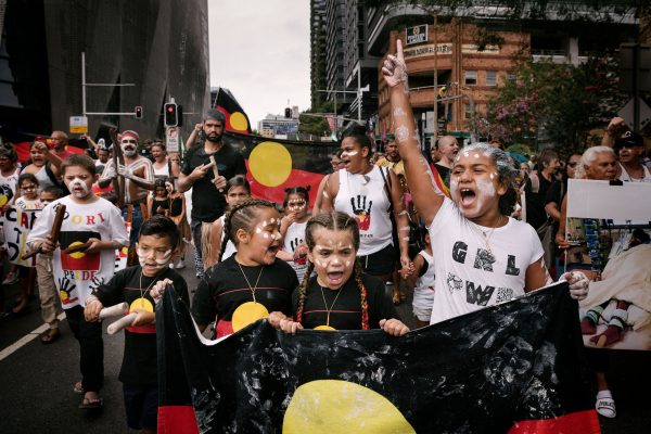The next generation of activists lead the survival day rally from The Block in Redfern, Sydney.