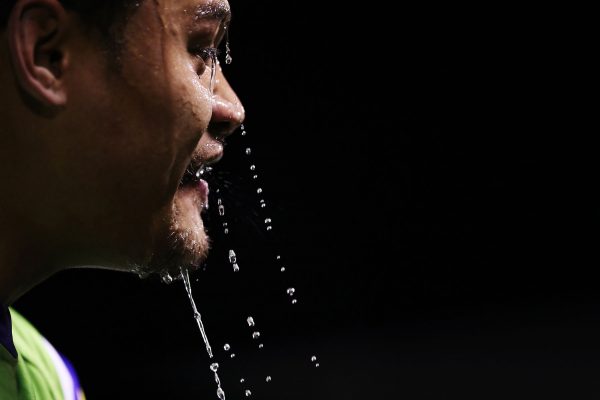 Canberra Raiders player Joseph Leilua pours water over his face during a Cronulla Sharks home game.