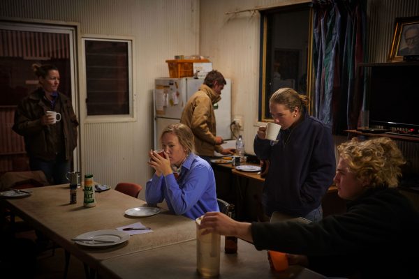 Stephanie Coombes, 29, (centre) with other station workers sharing breakfast and coffee before sunrise. The team of workers sleep, work, eat and even party together; the life builds close relationships and a feeling of camaraderie some compare to the army, due to the intensity of the work and the isolation.